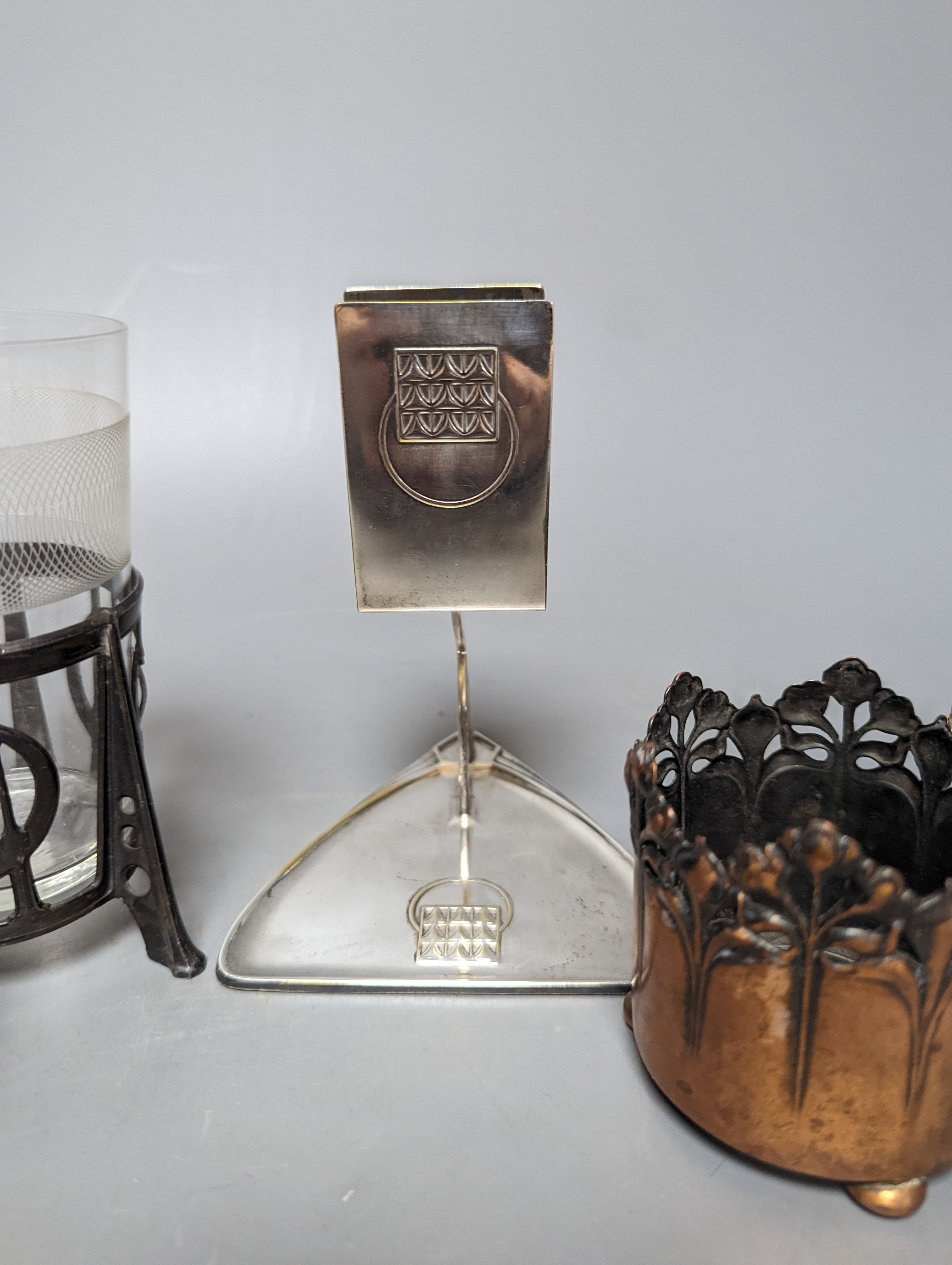 A pair of early WMF copper cup holders, pewter cup holder and a WMF matchbox holder